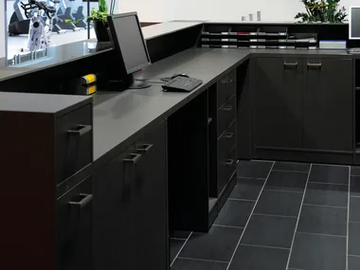 VEMO - Low melamine-faced chipboard office storage unit with hinged doors by FIT INTERIORS - view 2